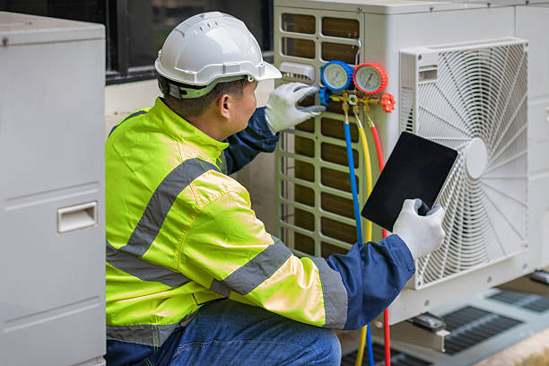 Professional Air Duct Cleaning technician working in Lynchburg, VA